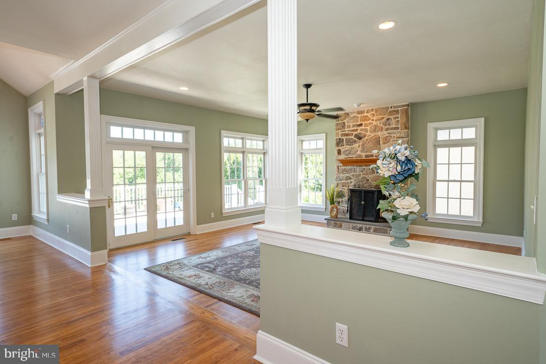 2 Spring Meadows Farm Lane Malvern, PA 19355 - Photo 18 of 63 a living room with hardwood floor and a large window