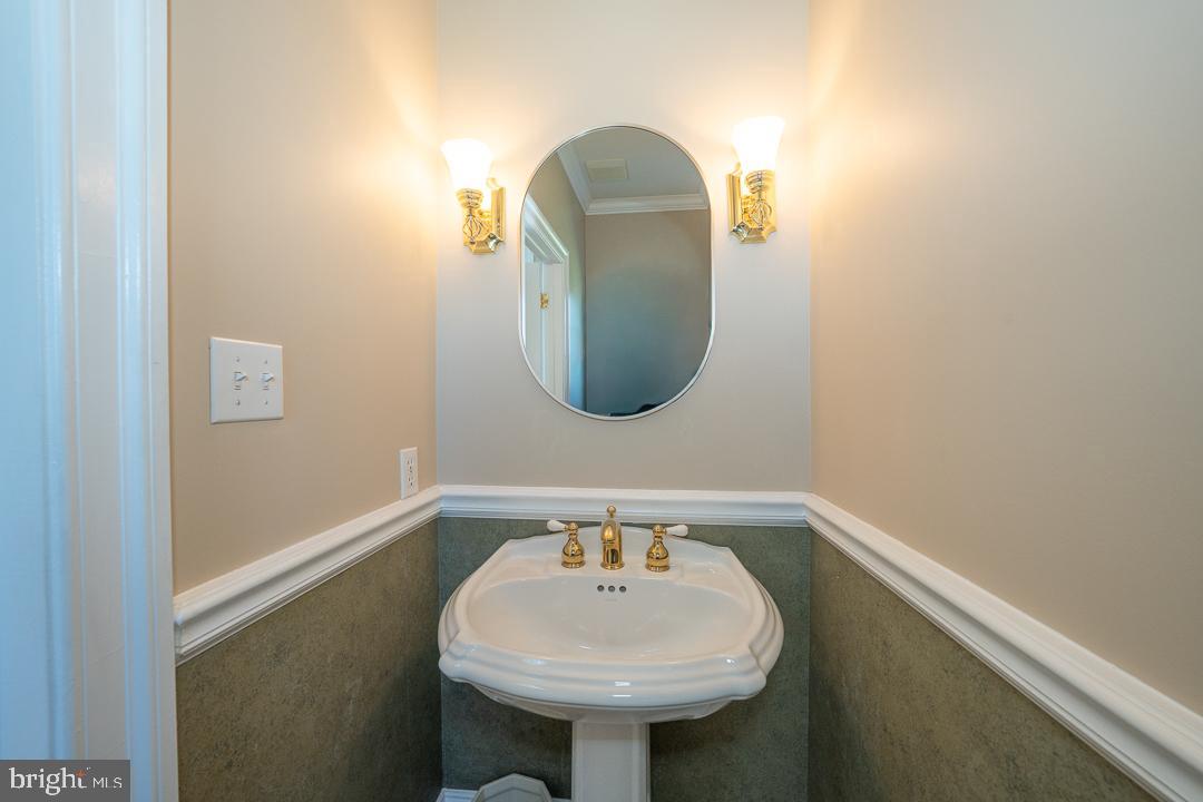 2 Spring Meadows Farm Lane Malvern, PA 19355 - Photo 20 of 63 a bathroom with a sink and a mirror
