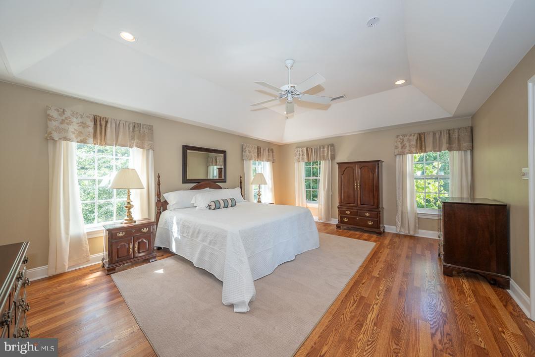 2 Spring Meadows Farm Lane Malvern, PA 19355 - Photo 28 of 63 a spacious bedroom with a large bed and a flat screen tv