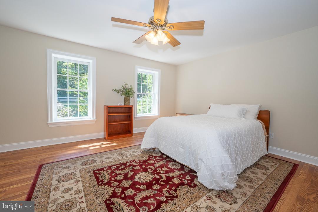 2 Spring Meadows Farm Lane Malvern, PA 19355 - Photo 47 of 63 a bedroom with a bed and a window