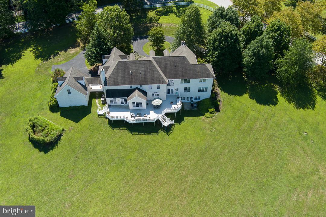 2 Spring Meadows Farm Lane Malvern, PA 19355 - Photo 63 of 63 an aerial view of a house with swimming pool garden and patio