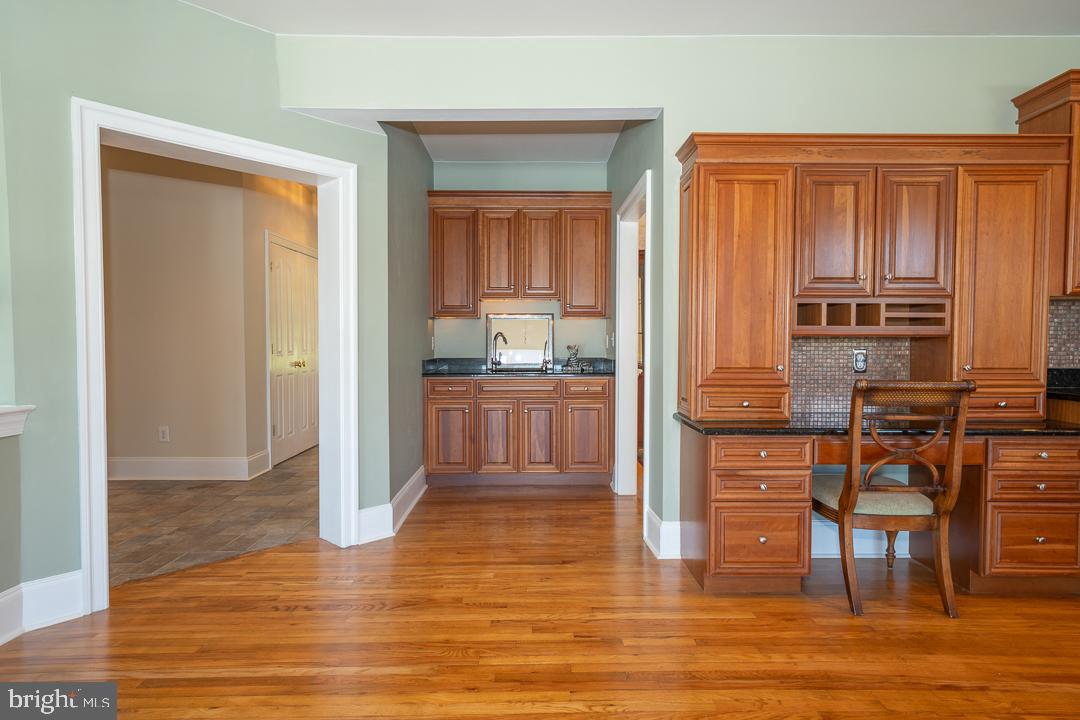 2 Spring Meadows Farm Lane Malvern, PA 19355 - Photo 10 of 63 a kitchen with stainless steel appliances wooden floor and chair
