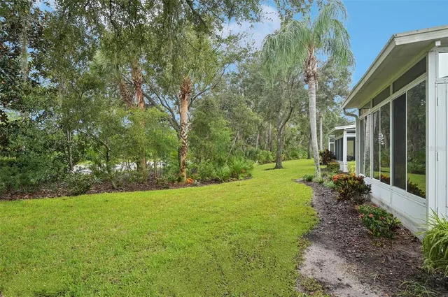 a view of a backyard with garden