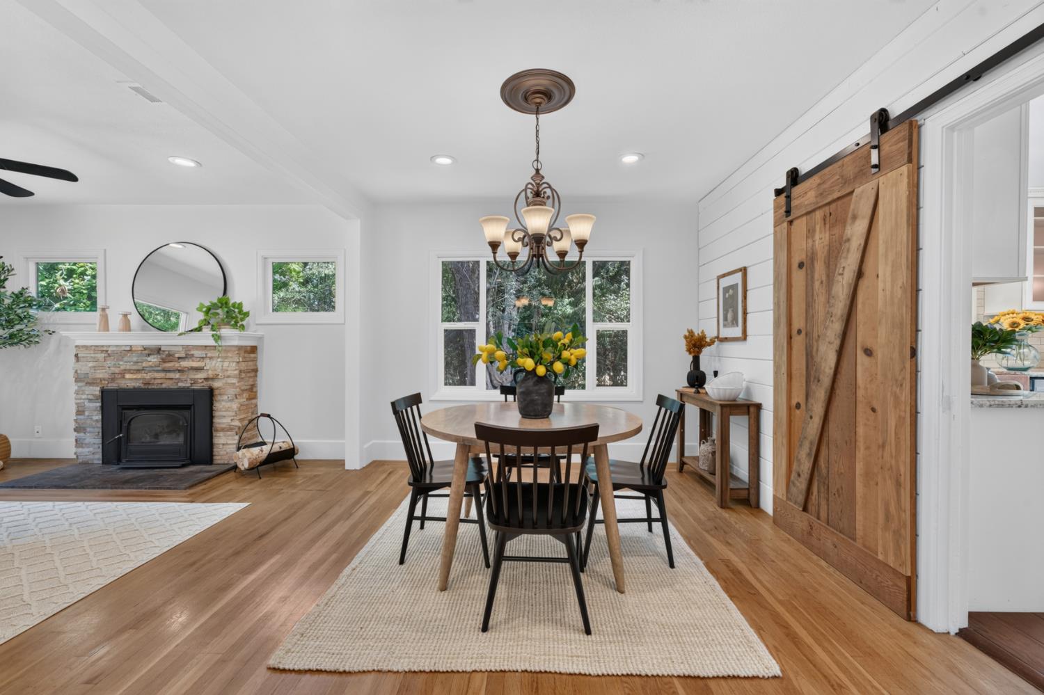 4335 Walnut Avenue Sacramento, CA 95821 - Photo 17 of 62 Inviting dining area with rustic barn door accents.
