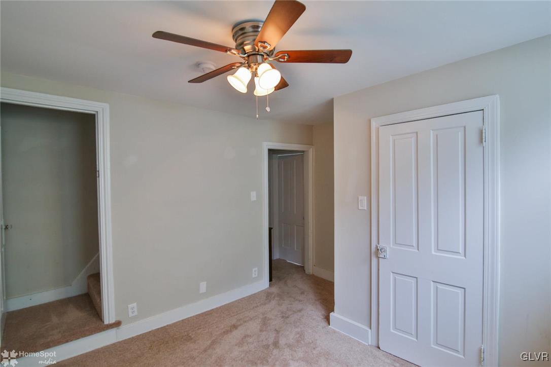 135 Howertown Road Catasauqua, PA 18032 - Photo 11 of 20 wooden floor in an empty room with a window