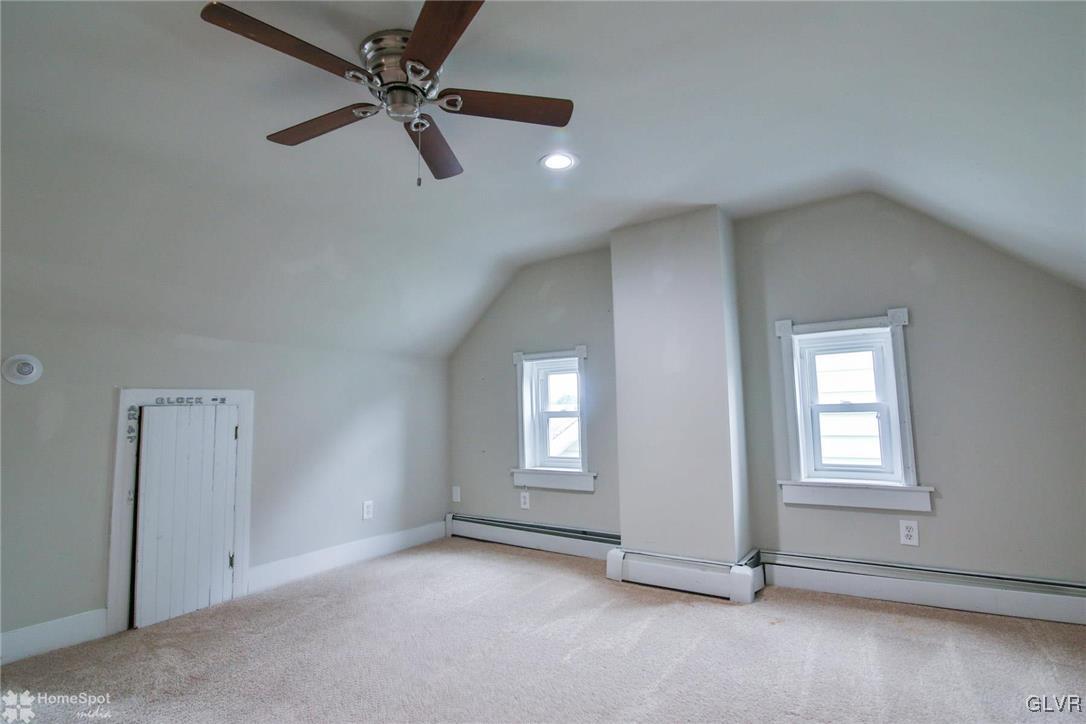 135 Howertown Road Catasauqua, PA 18032 - Photo 15 of 20 an empty room with windows and fan