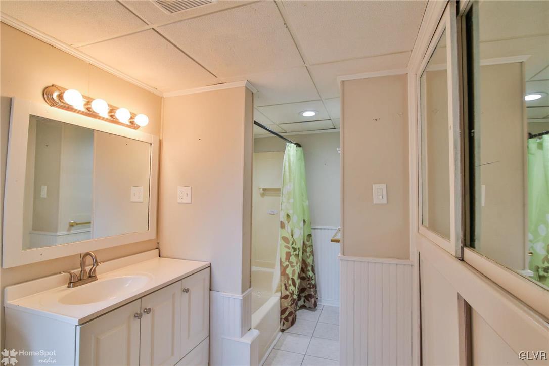 135 Howertown Road Catasauqua, PA 18032 - Photo 16 of 20 a bathroom with a sink and a mirror