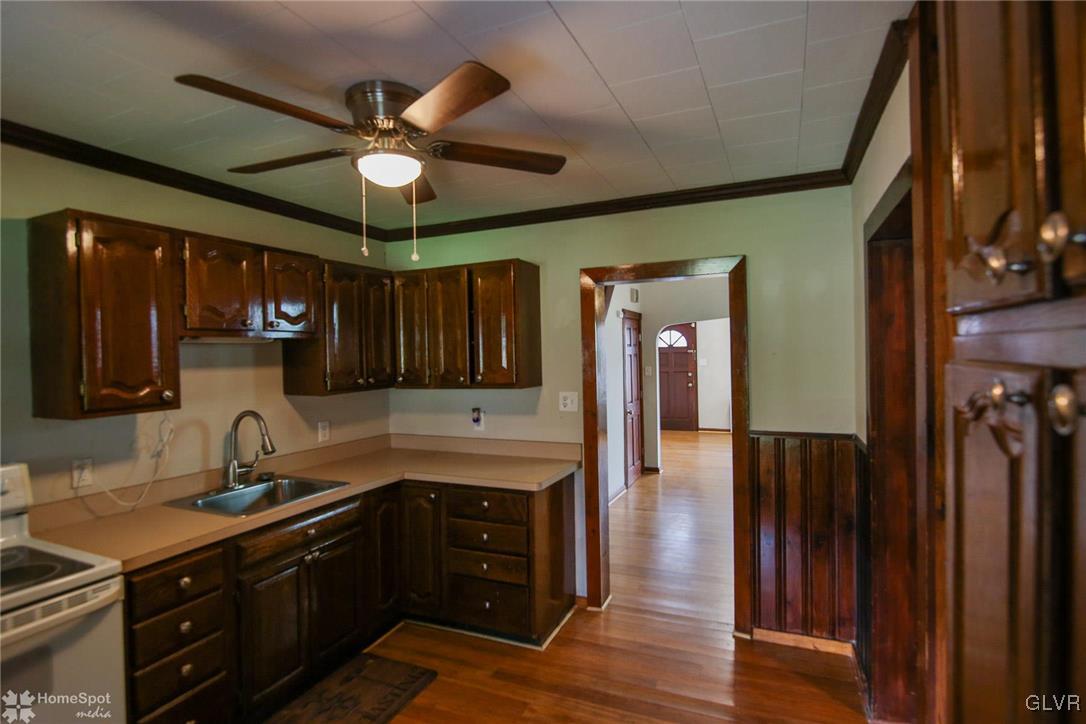 135 Howertown Road Catasauqua, PA 18032 - Photo 2 of 20 a kitchen with a sink cabinets and window