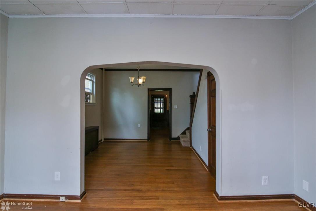 135 Howertown Road Catasauqua, PA 18032 - Photo 6 of 20 a view of a hallway with wooden floor