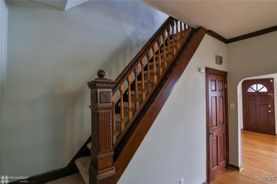 135 Howertown Road Catasauqua, PA 18032 - Photo 7 of 20 a view of a hallway with wooden floor and entryway