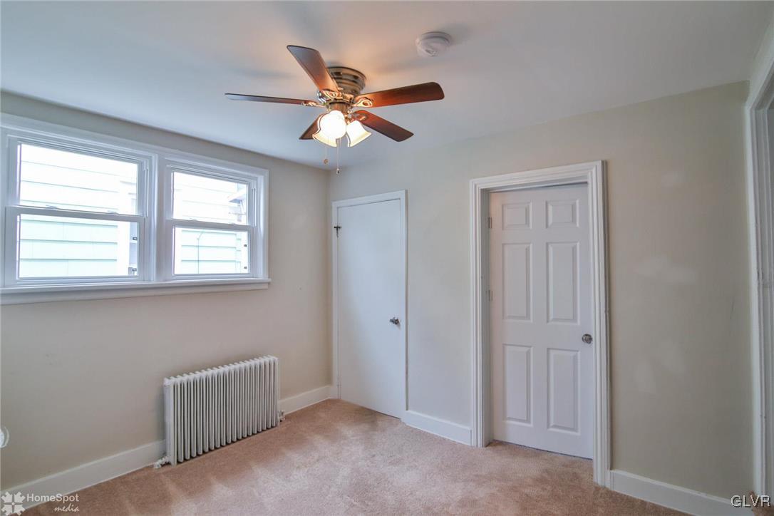 135 Howertown Road Catasauqua, PA 18032 - Photo 10 of 20 a view of an empty room with a window