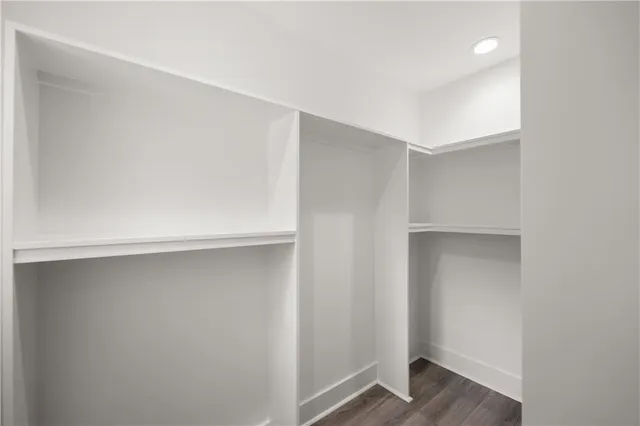 a en suite bathroom with a toilet sink and mirror