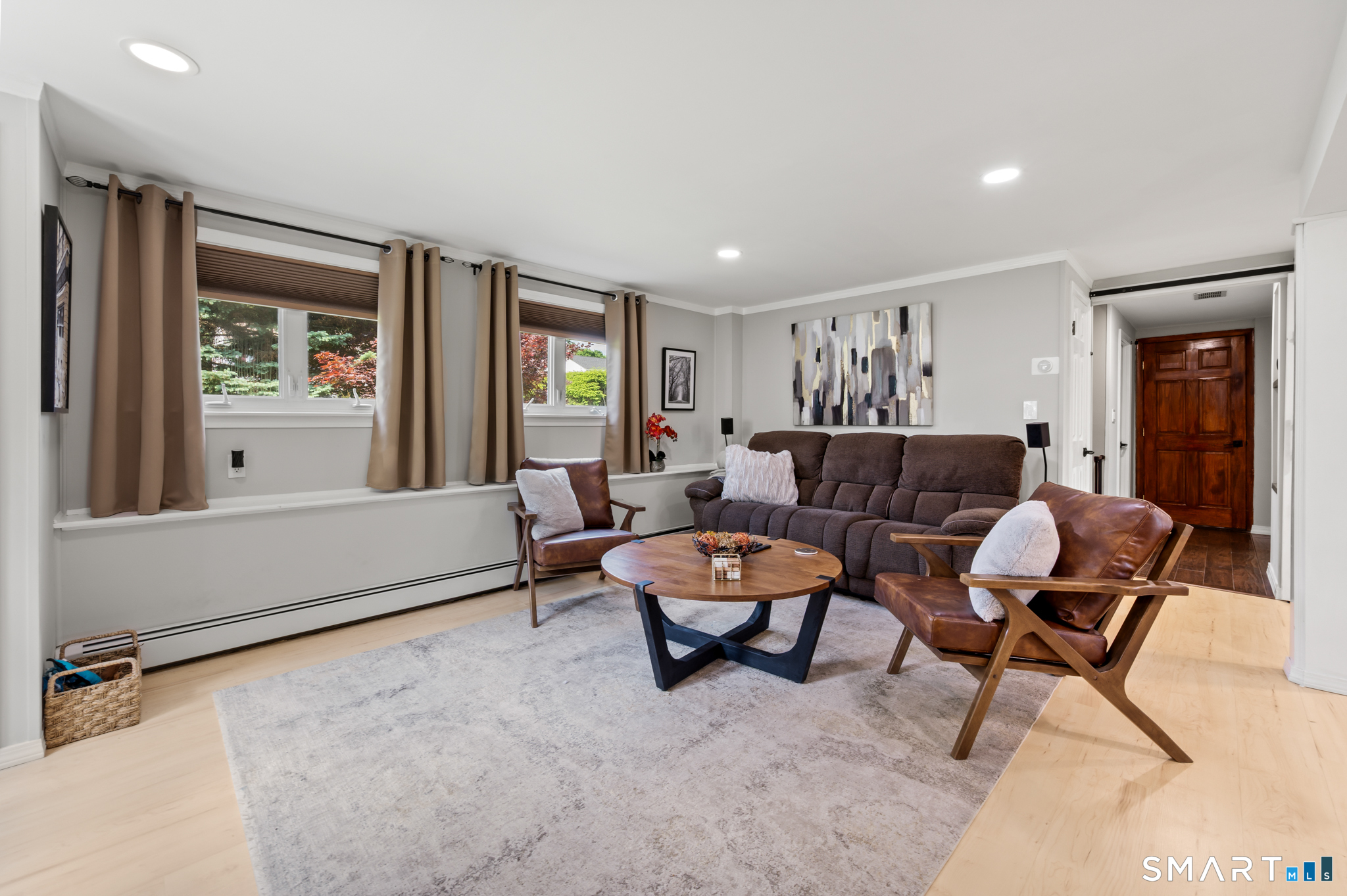 201 Ridge Crest Circle Wethersfield, CT 06109 - Photo 24 of 35 a living room with furniture and a window
