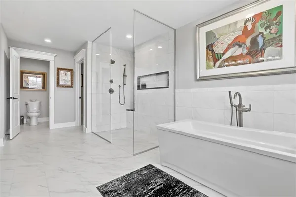 a bathroom with a sink and a window