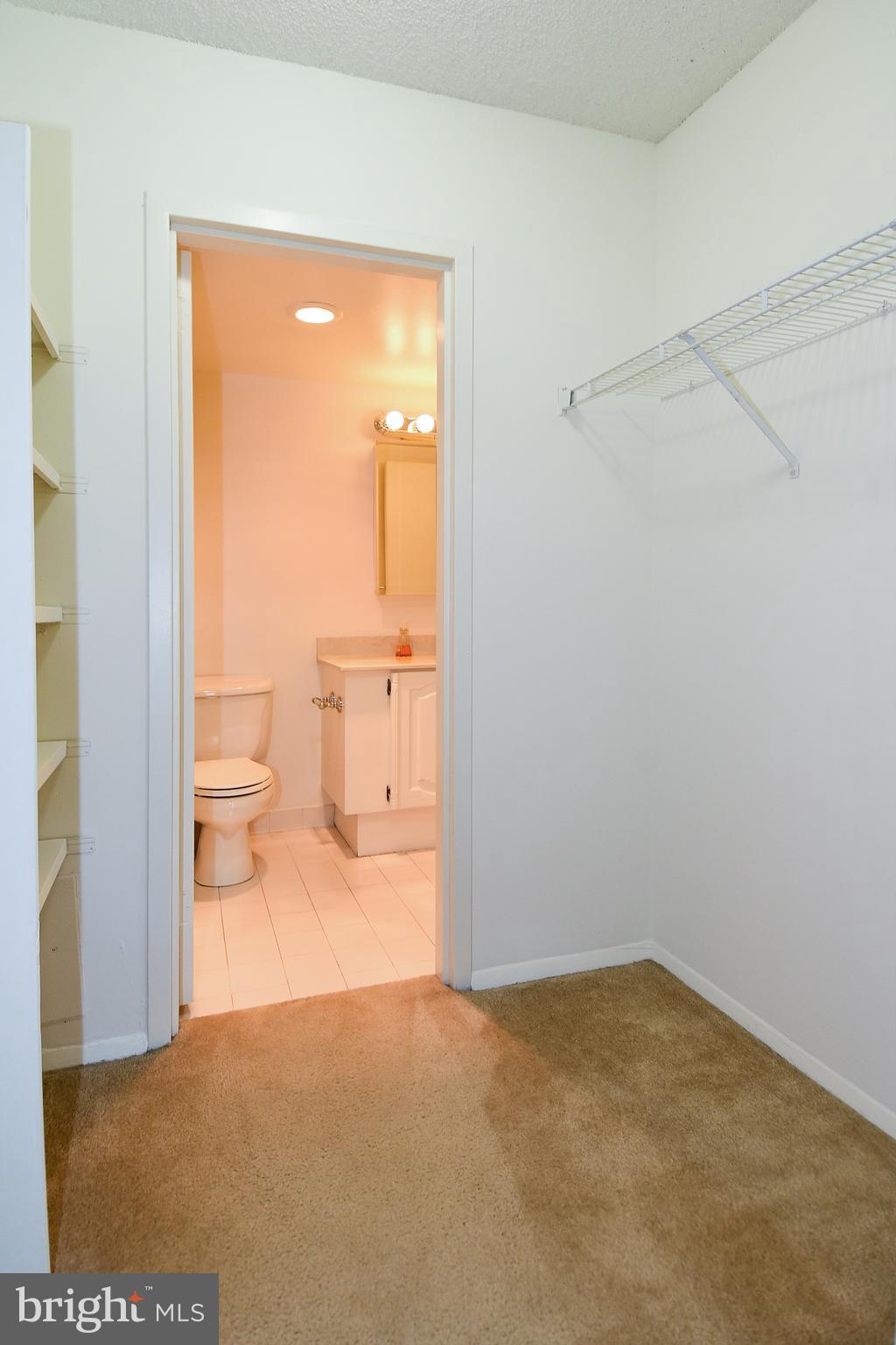 5225 Pooks Hill Road, Unit 1003S Bethesda, MD 20814 - Photo 11 of 30 a bathroom view with a toilet