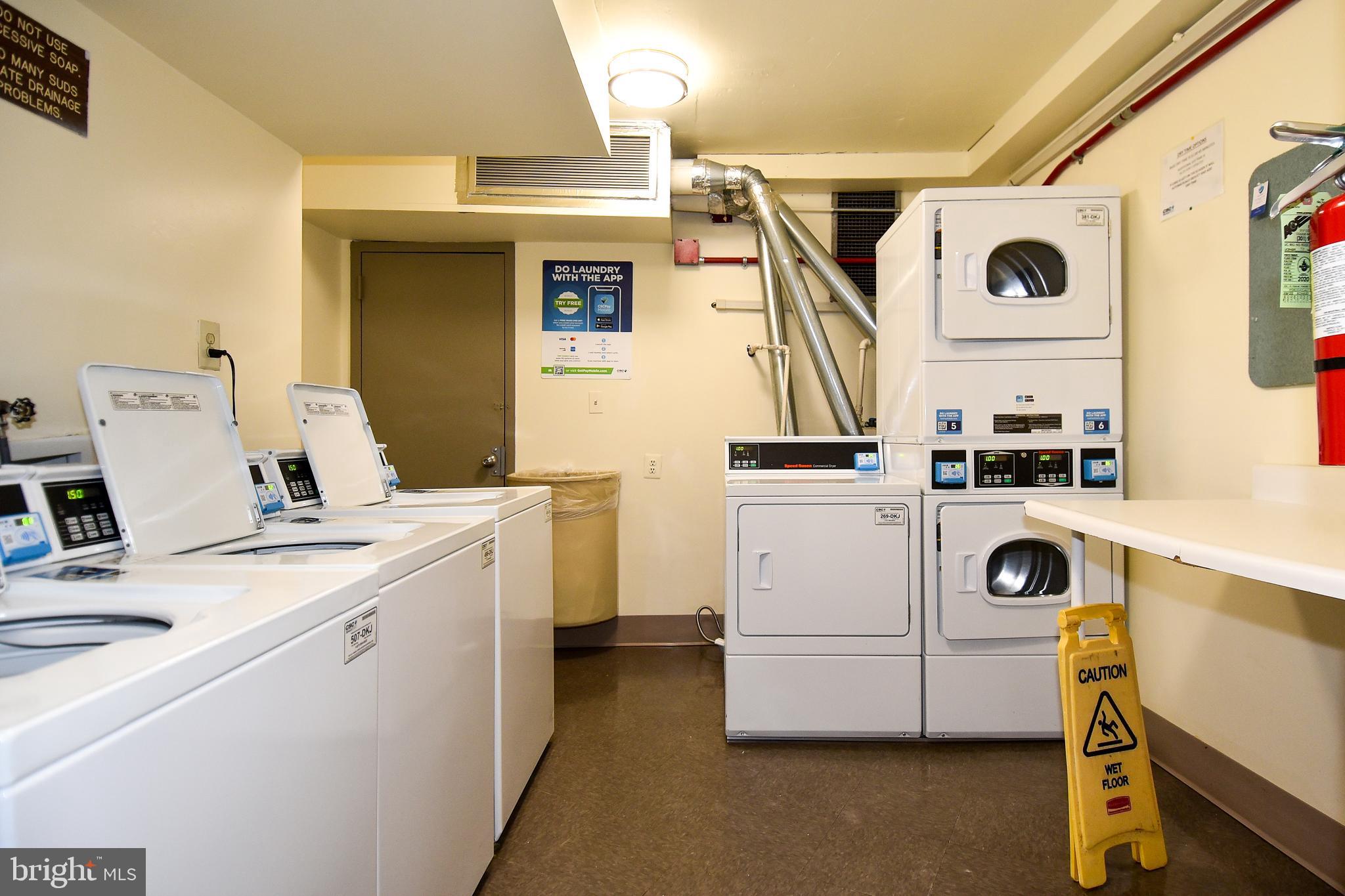 5225 Pooks Hill Road, Unit 1003S Bethesda, MD 20814 - Photo 12 of 30 a utility room with dryer and washer