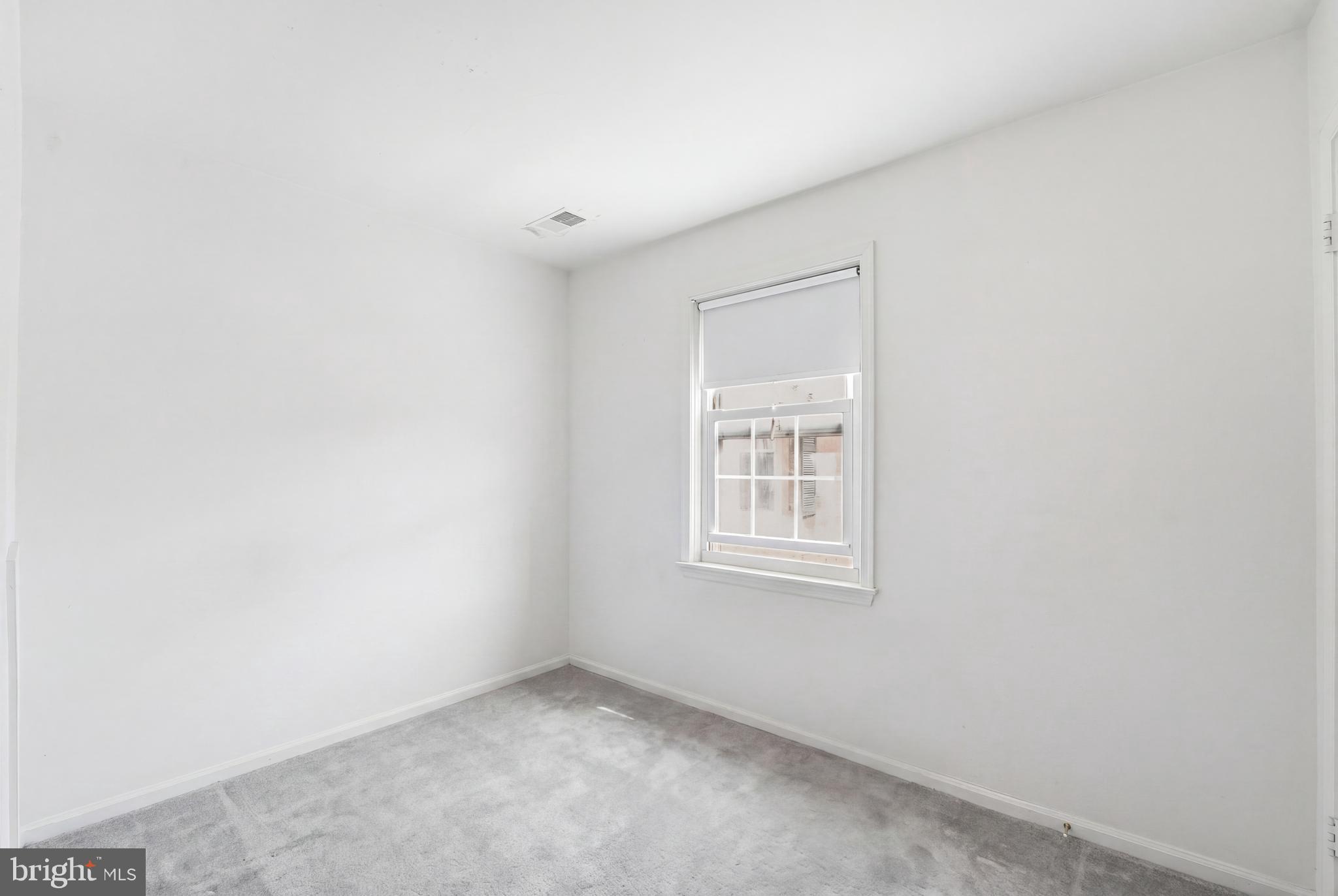 2011 37th Street Southeast, Unit 202 Washington, DC 20020 - Photo 13 of 24 an empty room with a window