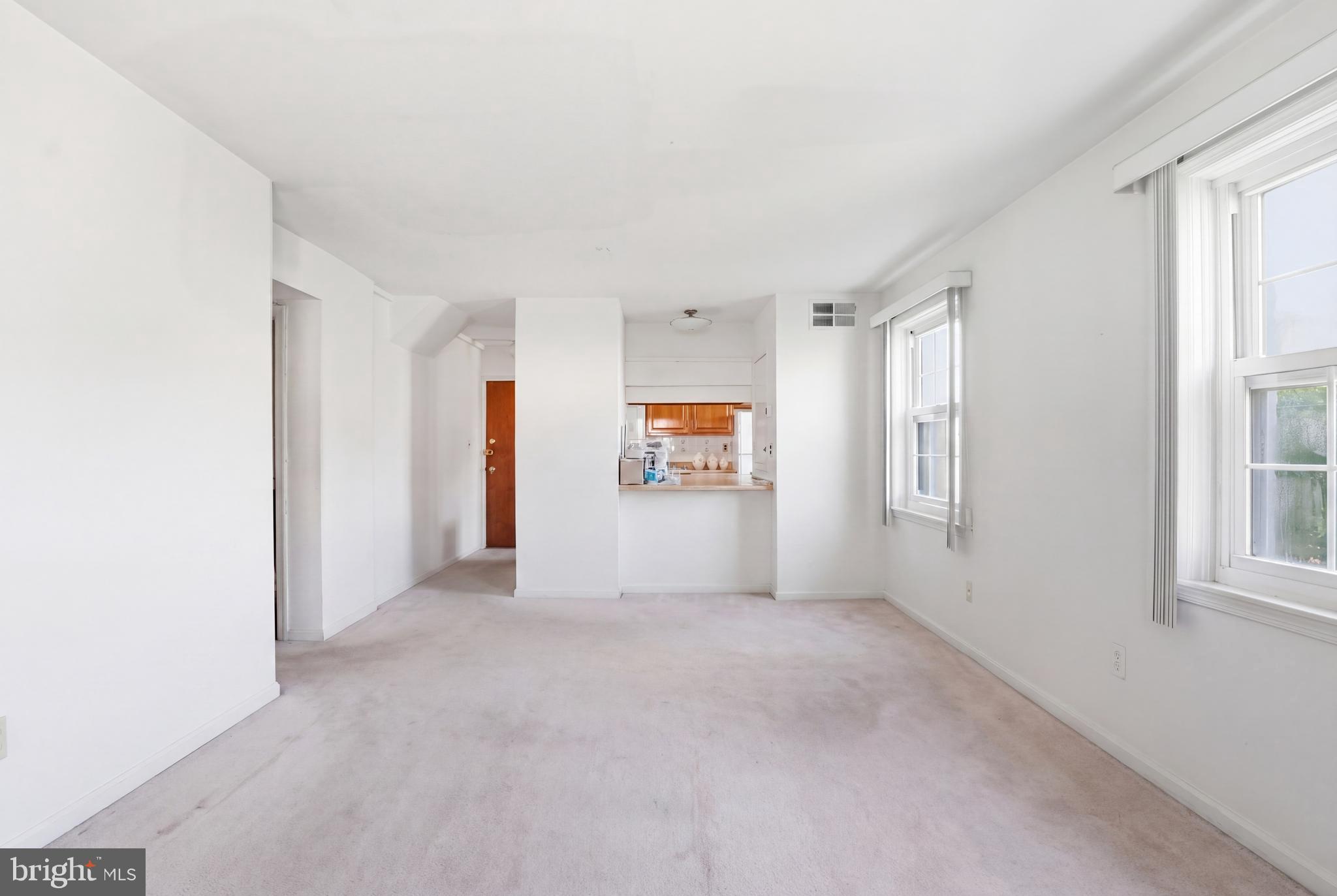 2011 37th Street Southeast, Unit 202 Washington, DC 20020 - Photo 19 of 24 an empty room with windows