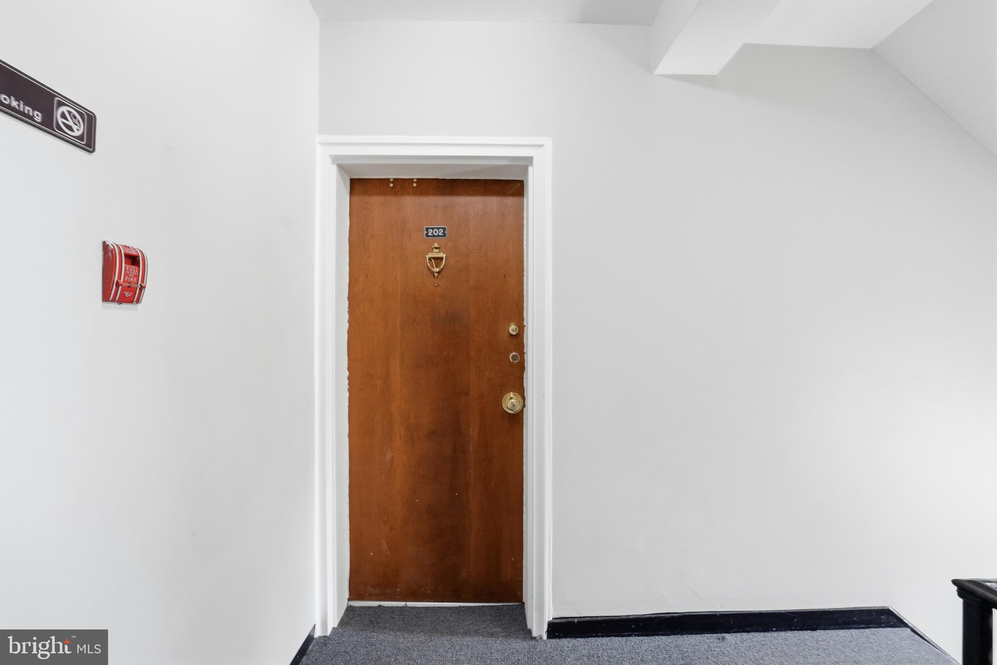 2011 37th Street Southeast, Unit 202 Washington, DC 20020 - Photo 3 of 24 a view of elevator with hallway
