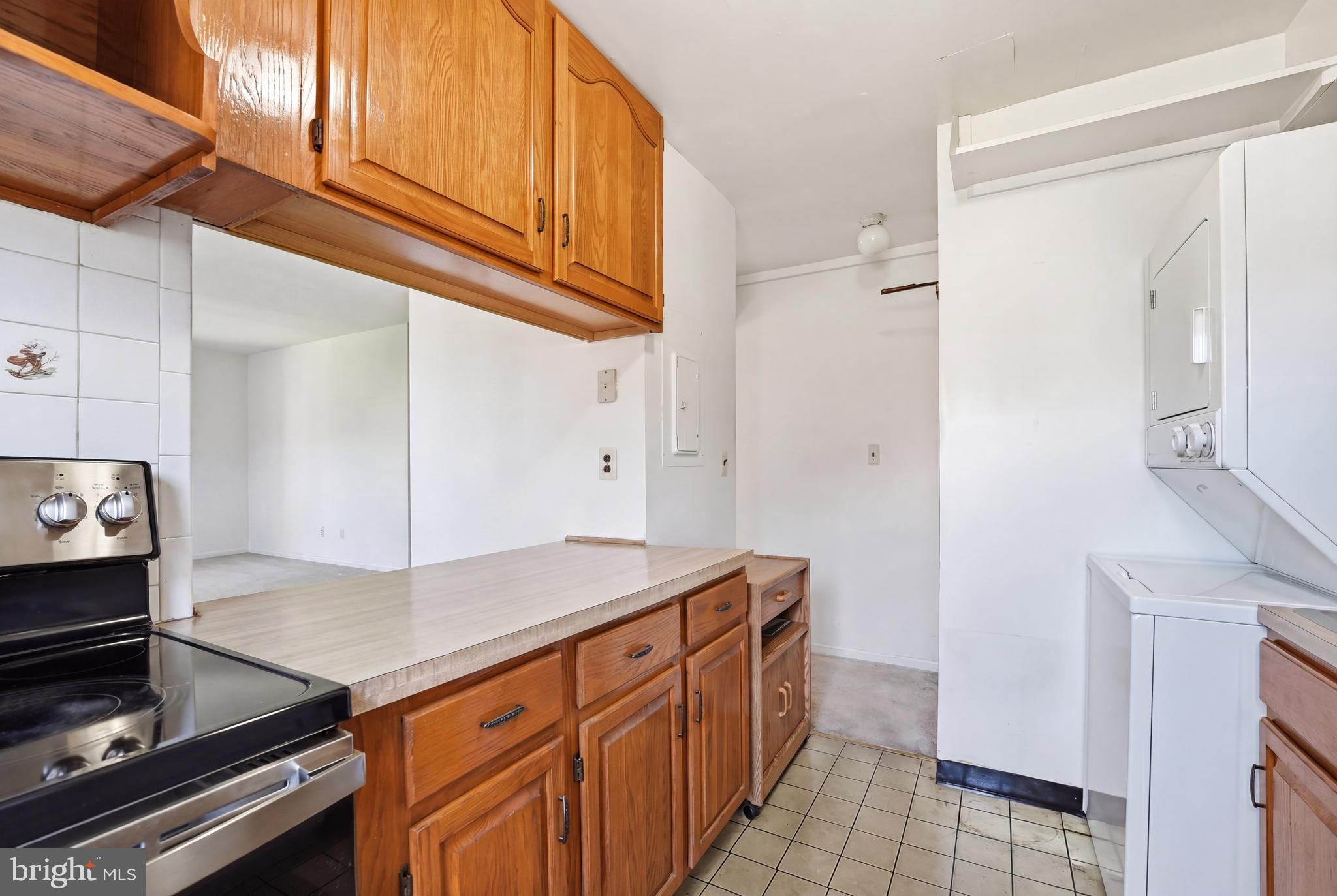 2011 37th Street Southeast, Unit 202 Washington, DC 20020 - Photo 5 of 24 a kitchen with a sink and cabinets