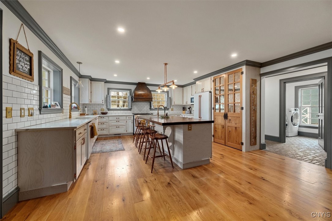 27 Madison Street Hamilton, NY 13346 - Photo 14 of 50 Kitchen with laundry room nearby
