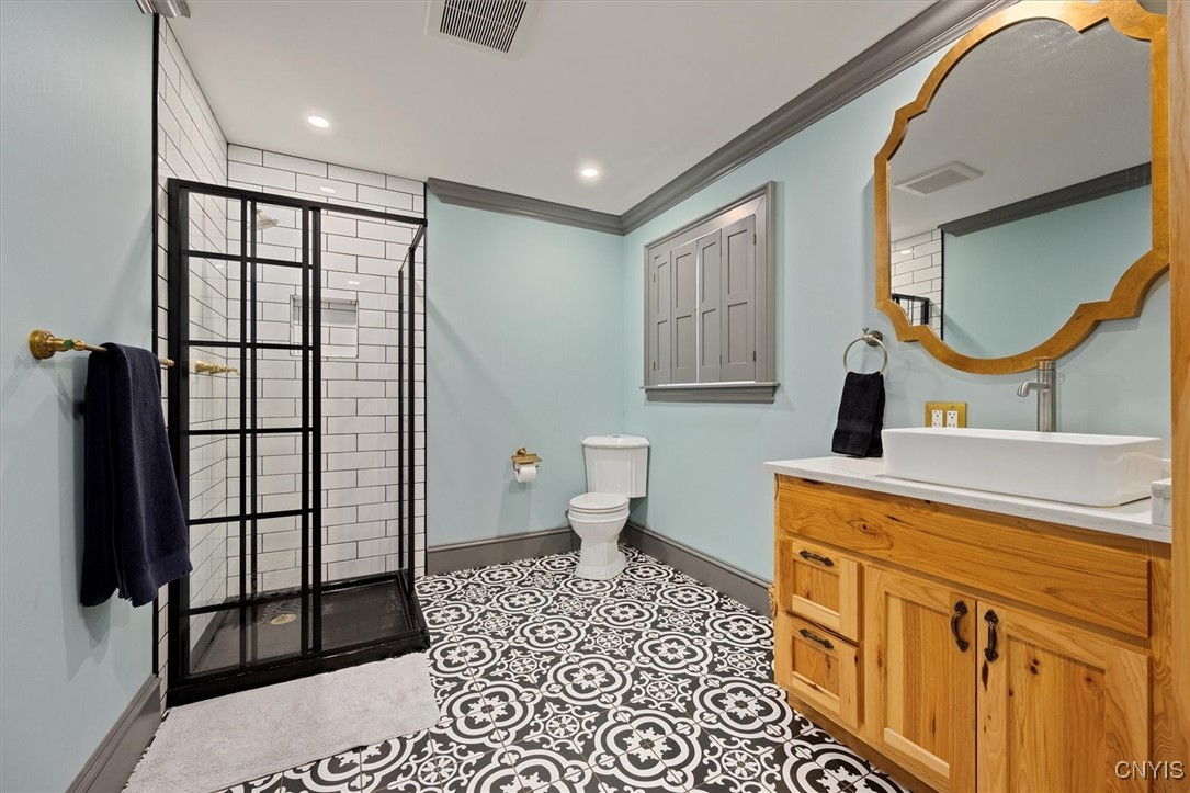 27 Madison Street Hamilton, NY 13346 - Photo 19 of 50 Full bath with shower off the kitchen dining area