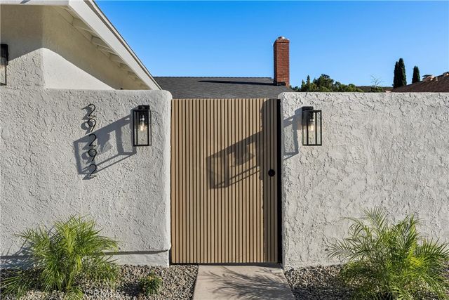 a street sign sitting on top of a building