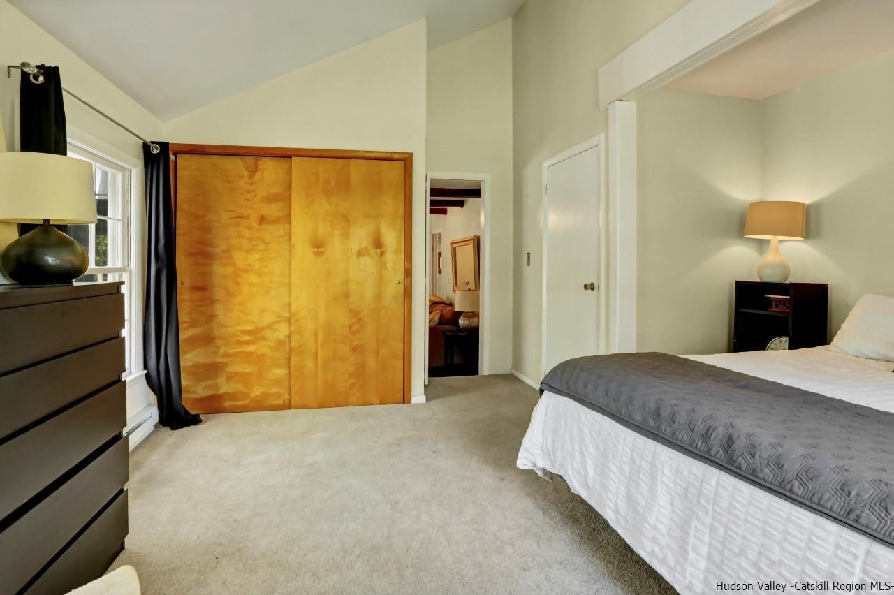10 Pine Tree Road West Hurley, NY 12491 - Photo 12 of 28 a bedroom with a bed and a window
