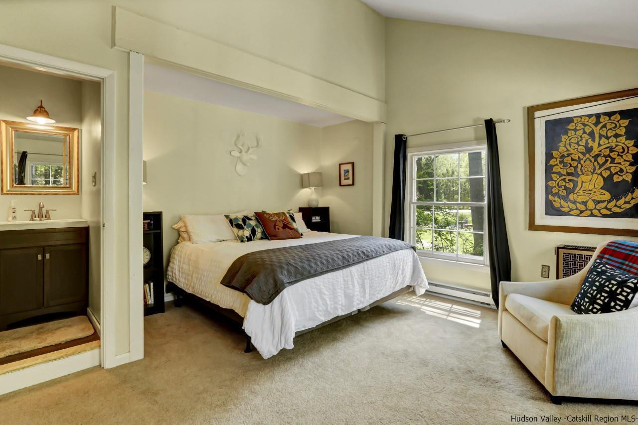 10 Pine Tree Road West Hurley, NY 12491 - Photo 10 of 28 a bedroom with a bed couch and window