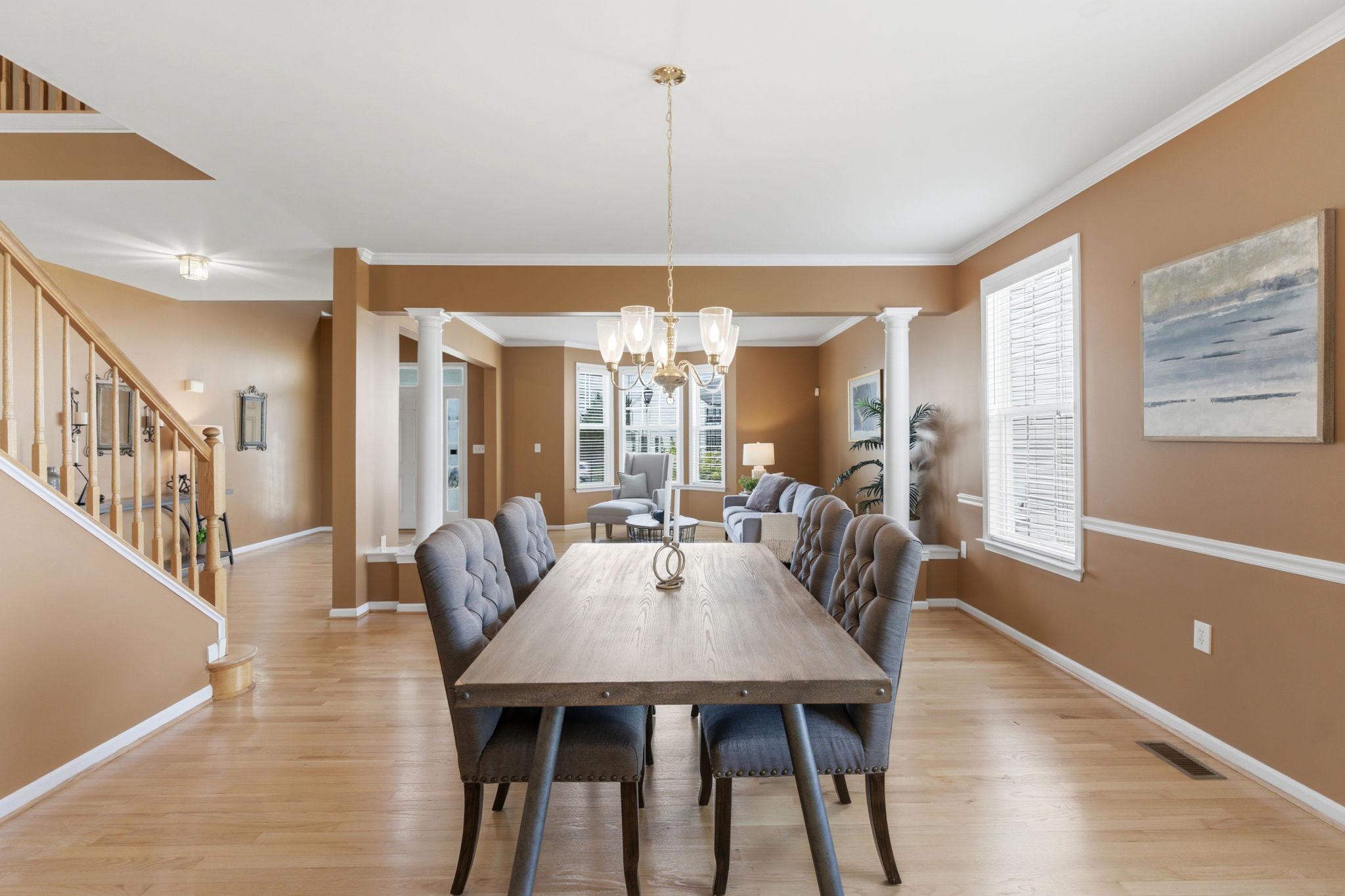 457 Hughs Road Charles Town, WV 25414 - Photo 19 of 73 Elegant dining space with warm tones.