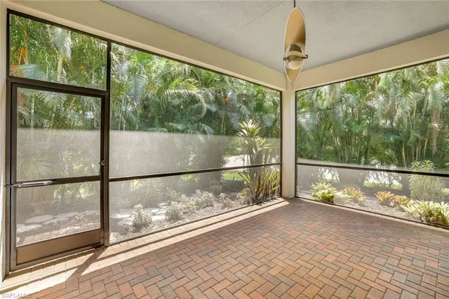 a view of a porch with a large window