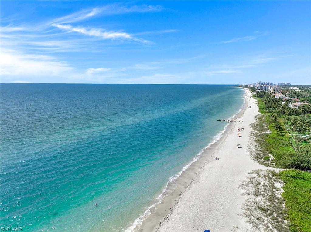 13404 Monticello Boulevard Naples, FL 34109 - Photo 23 of 23 Nearby Naples Beach – Enjoy the pristine white sand and sparkling turquoise waters just minutes from your doorstep. This prime location offers easy access to the Gulf of Mexico, where you can relax, swim, and take in breathtaking sunsets year-round.