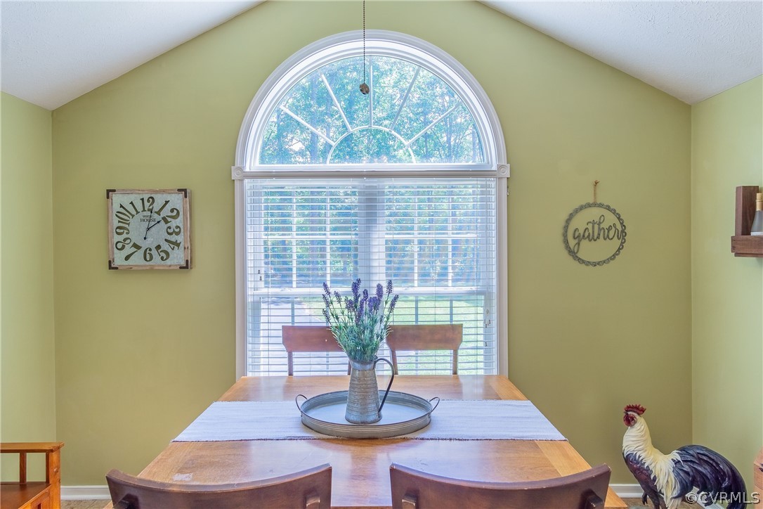 460 Rosebud Run Aylett, VA 23009 - Photo 13 of 32 a living room with couch and a table