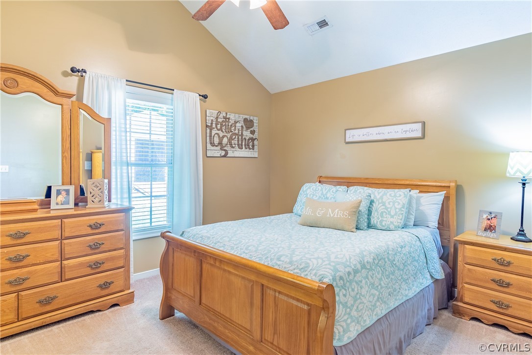 460 Rosebud Run Aylett, VA 23009 - Photo 16 of 32 a bedroom with a bed and dresser