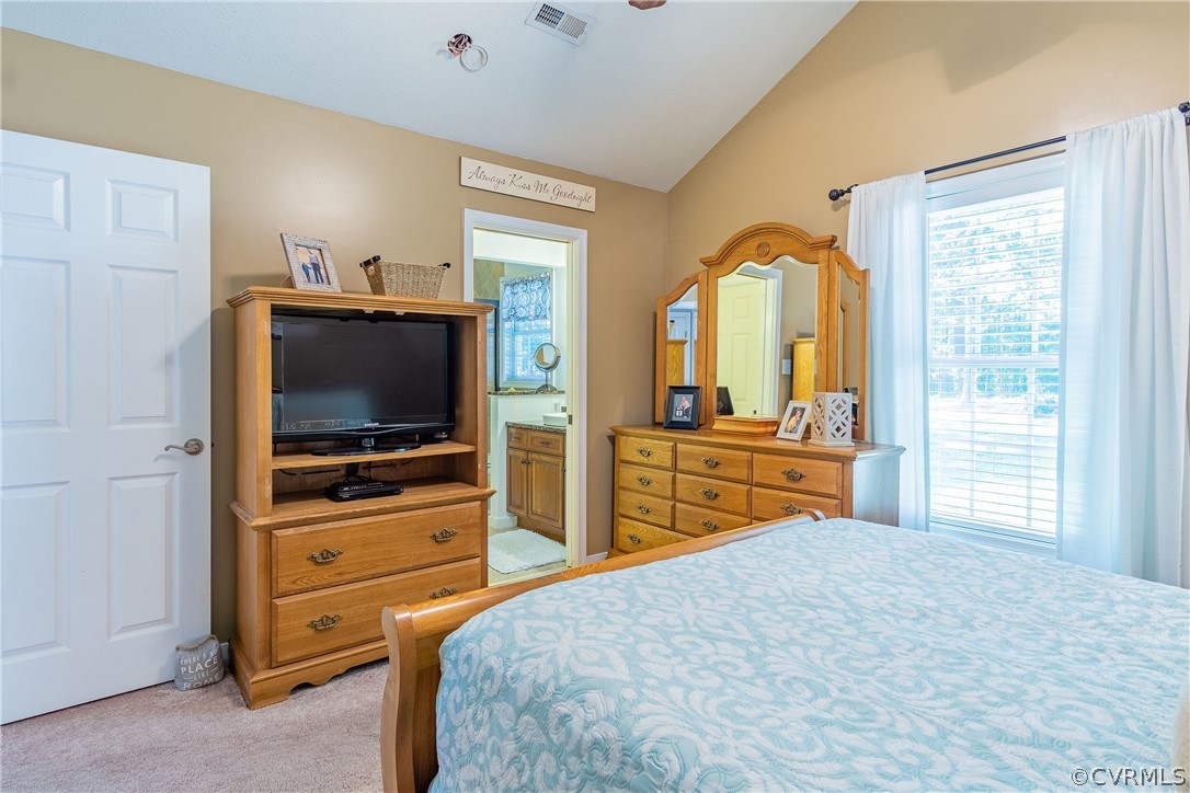 460 Rosebud Run Aylett, VA 23009 - Photo 17 of 32 a bedroom with furniture and a flat screen tv