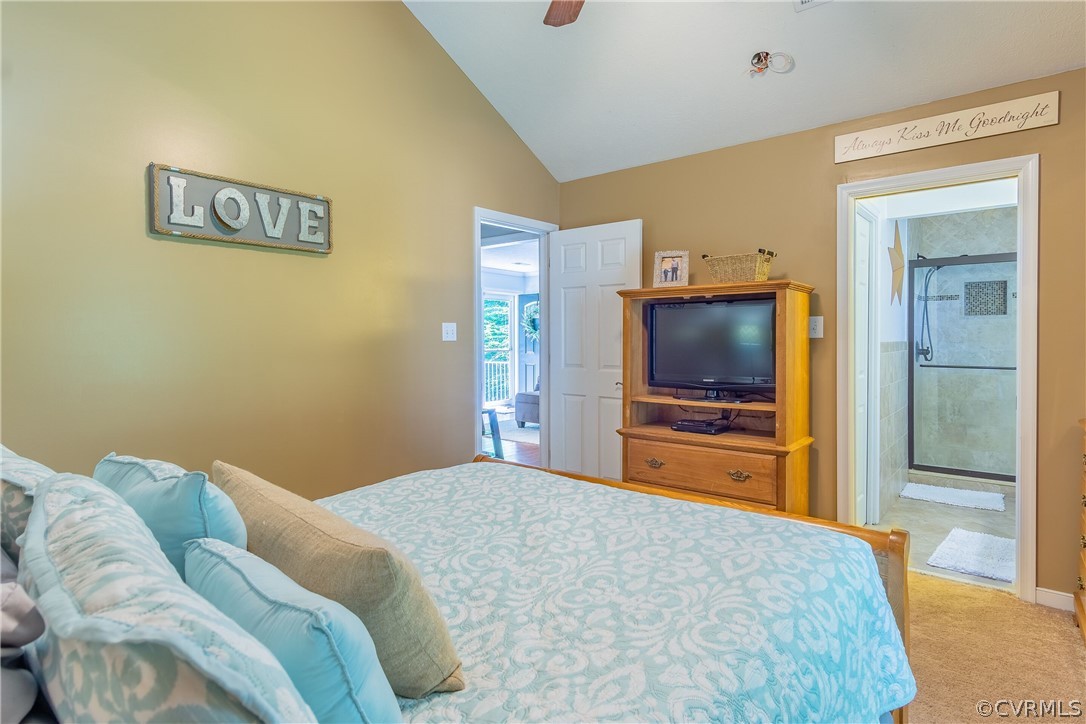 460 Rosebud Run Aylett, VA 23009 - Photo 18 of 32 a bedroom with a bed and a flat screen tv