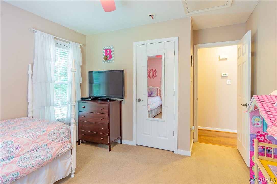 460 Rosebud Run Aylett, VA 23009 - Photo 22 of 32 a bedroom with a bed and flat screen tv