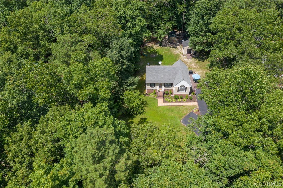 460 Rosebud Run Aylett, VA 23009 - Photo 30 of 32 an aerial view of a house with a yard swimming pool and outdoor seating
