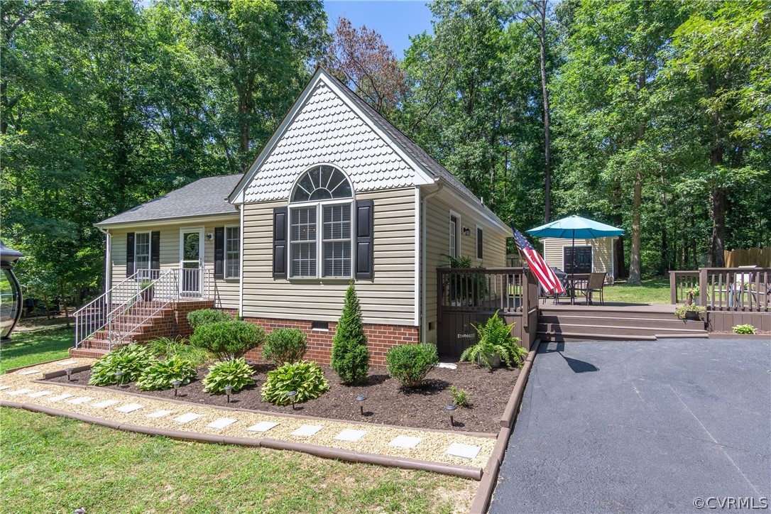 460 Rosebud Run Aylett, VA 23009 - Photo 3 of 32 a view of house with yard and sitting area