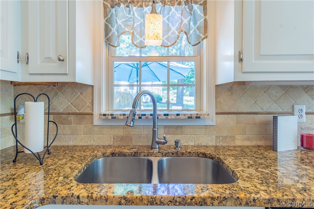 460 Rosebud Run Aylett, VA 23009 - Photo 8 of 32 a kitchen with a sink and cabinets