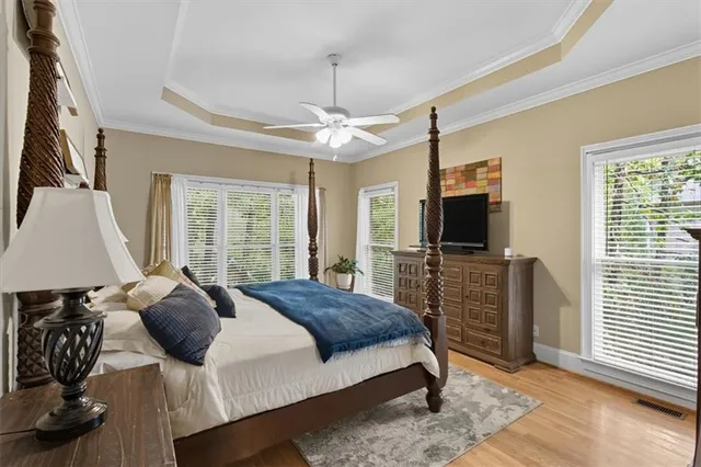 a bed room with a bed and a window