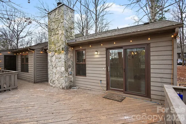 a view of outdoor space and wooden deck