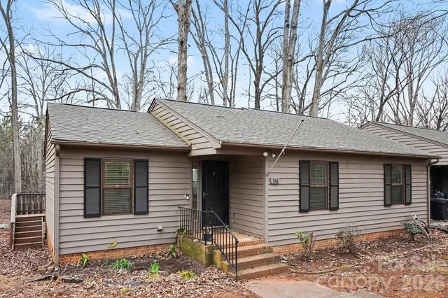 a front view of a house with garage