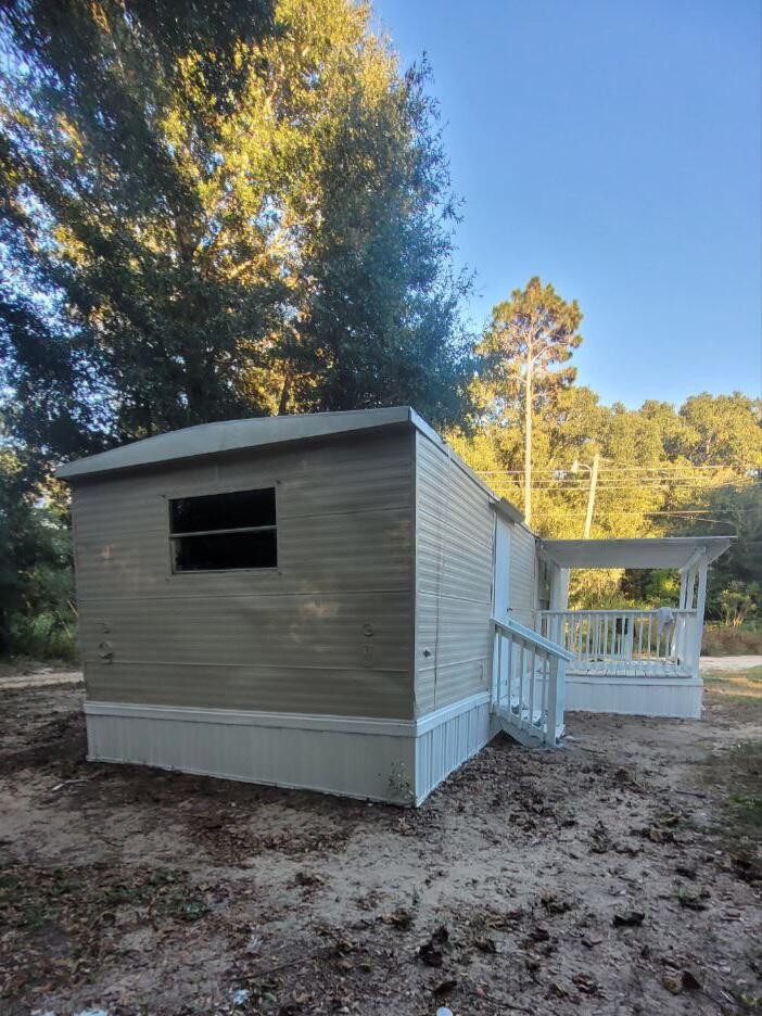 864 East Chestnut Avenue, Unit D Crestview, FL 32539 - Photo 1 of 10 a view of a outdoor space