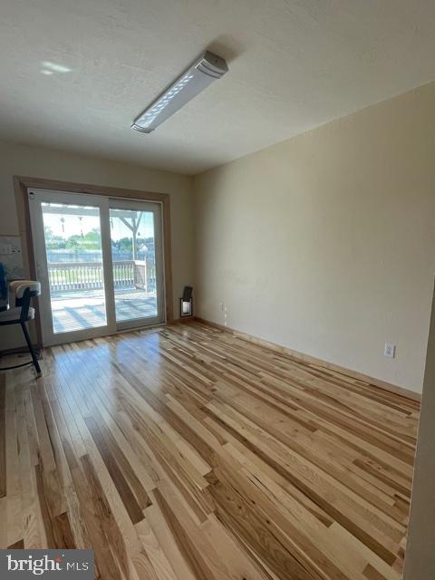 11481 Reed Circle Ridgely, MD 21660 - Photo 22 of 39 Dining Room to large back Deck overlooking Pool
