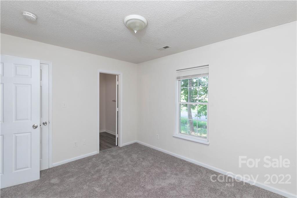 351 Haigler Street Rock Hill, SC 29732 - Photo 12 of 16 an empty room with windows and closet