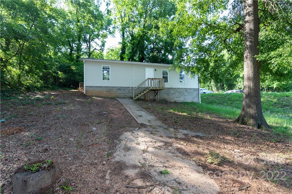 351 Haigler Street Rock Hill, SC 29732 - Photo 15 of 16 a view of a house with a yard and large tree