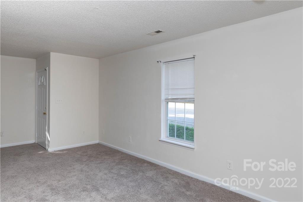 351 Haigler Street Rock Hill, SC 29732 - Photo 4 of 16 a view of an empty room with a window