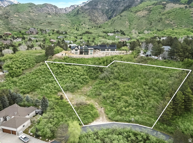 10667 Hidden Ridge Lane Sandy, UT 84092 - Photo 6 of 21 Aerial overview of property's location featuring mountains and property parcel outlined