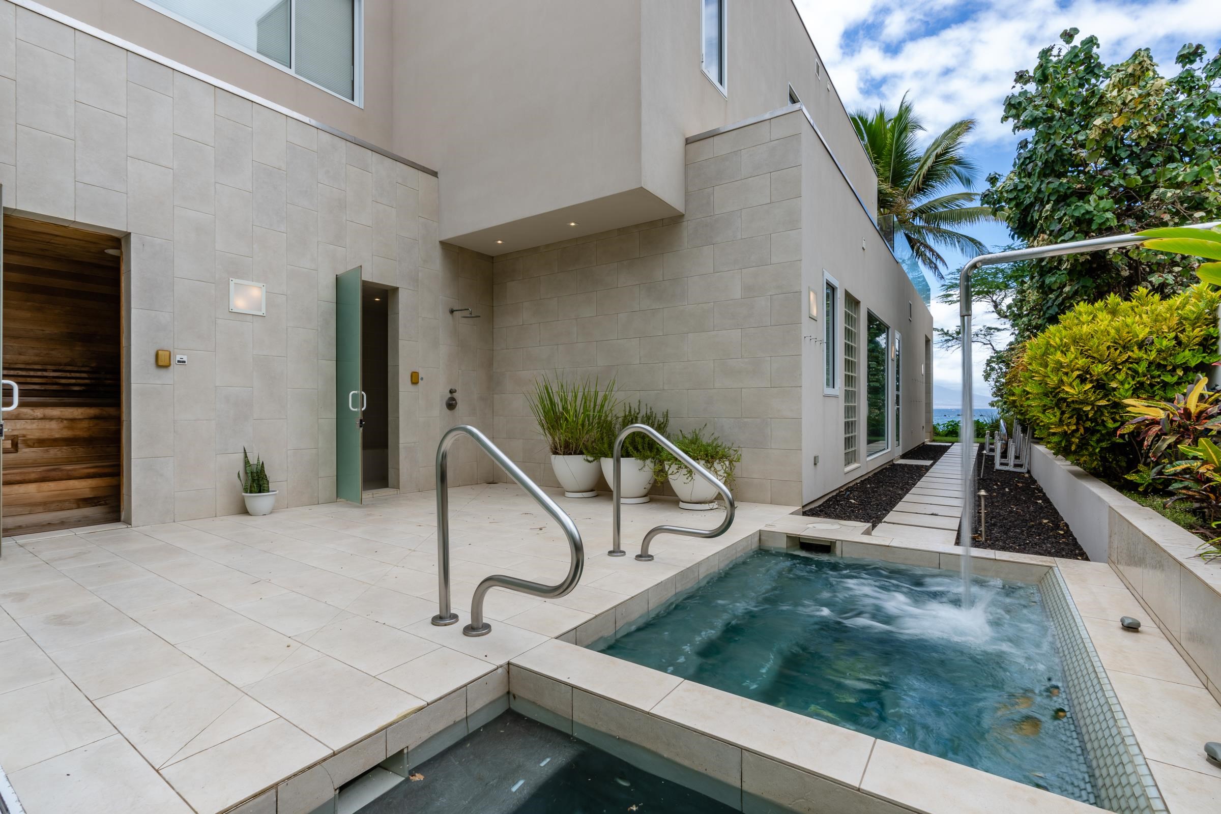 4572 Makena Road Kihei, HI 96753 - Photo 18 of 30 a view of a chair and tables in the balcony